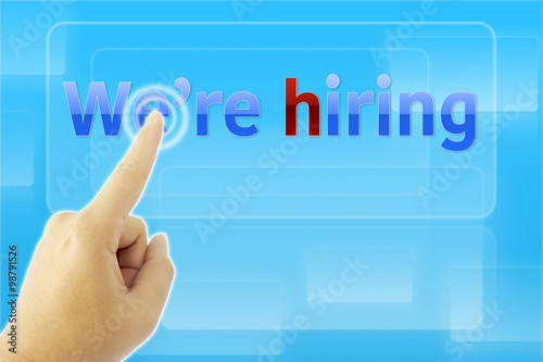 touching We're hiring sign ...