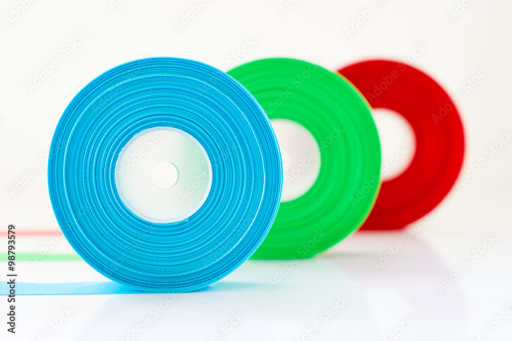 Red Green Blue ribbon Roll isolated on white background , Select focus on blue