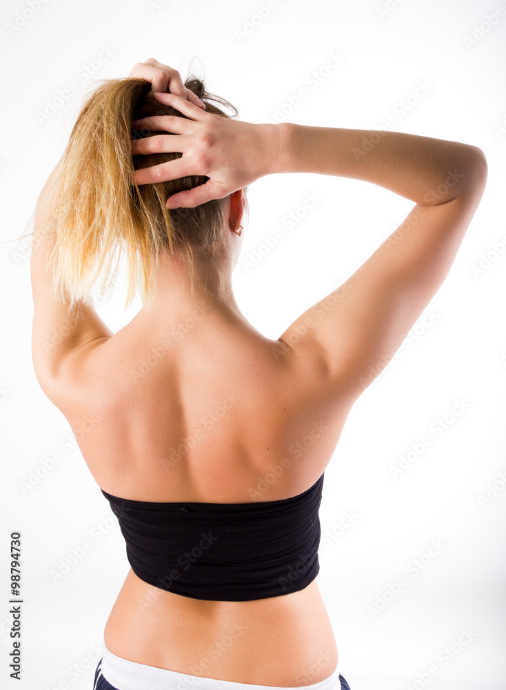 beautiful girl holding back hair with his hands beautiful girl holding back hair with his hands