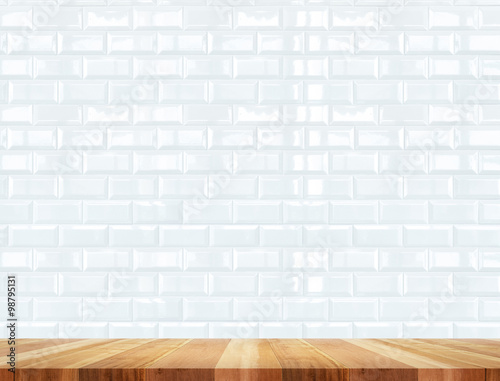 Empty wood table and ceramic tile brick wall in background,Mock