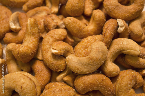 This is a closeup photograph of smoked cashews