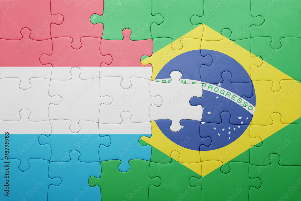 puzzle with the national flag of luxembourg and brazil