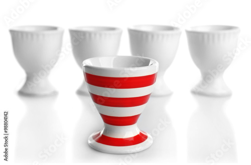 Red and White stripe egg cups, isolated on white