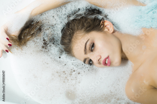 Flirtatious woman in bath