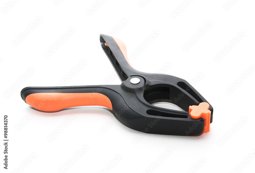 Plastic clamps used for clamping items isolated on white background Plastic clamps used for clamping items isolated on white background