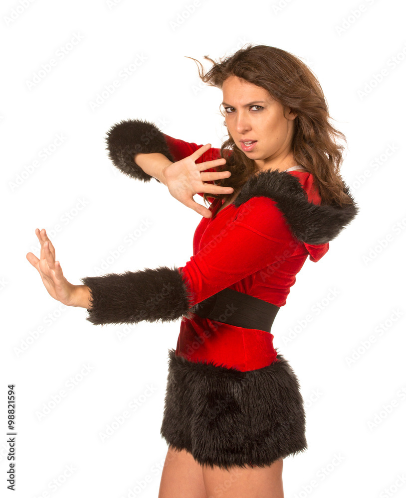 Girl in a New Year's suit struggling with the wind Girl in a New Year's suit struggling with the wind