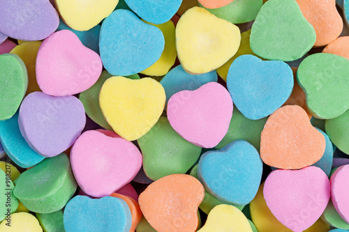 Happy Valentines day with colorful heart shaped candies