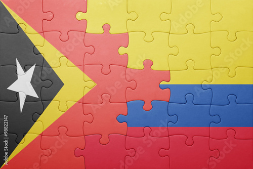 puzzle with the national flag of colombia and east timor
