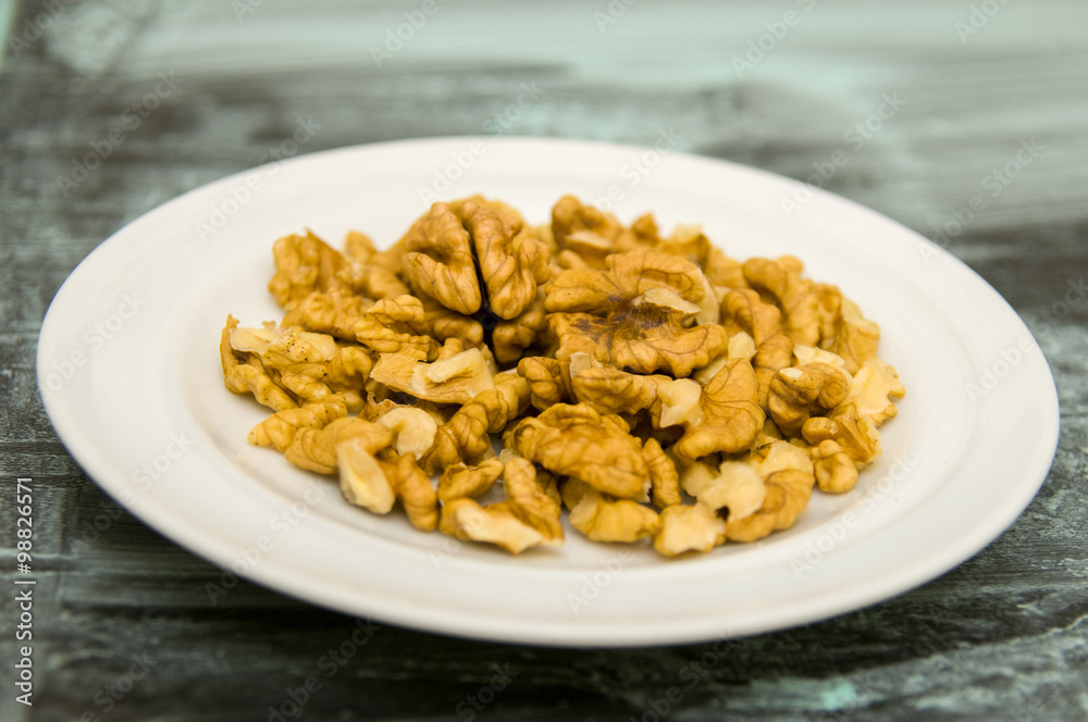 Walnuts Shelled on Texture Background in Blue Walnuts Shelled on Texture Background in Blue
