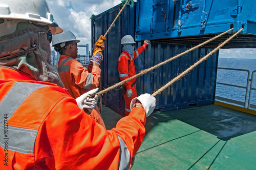 workers on duty at Offshore construction platform for production © think4photop
