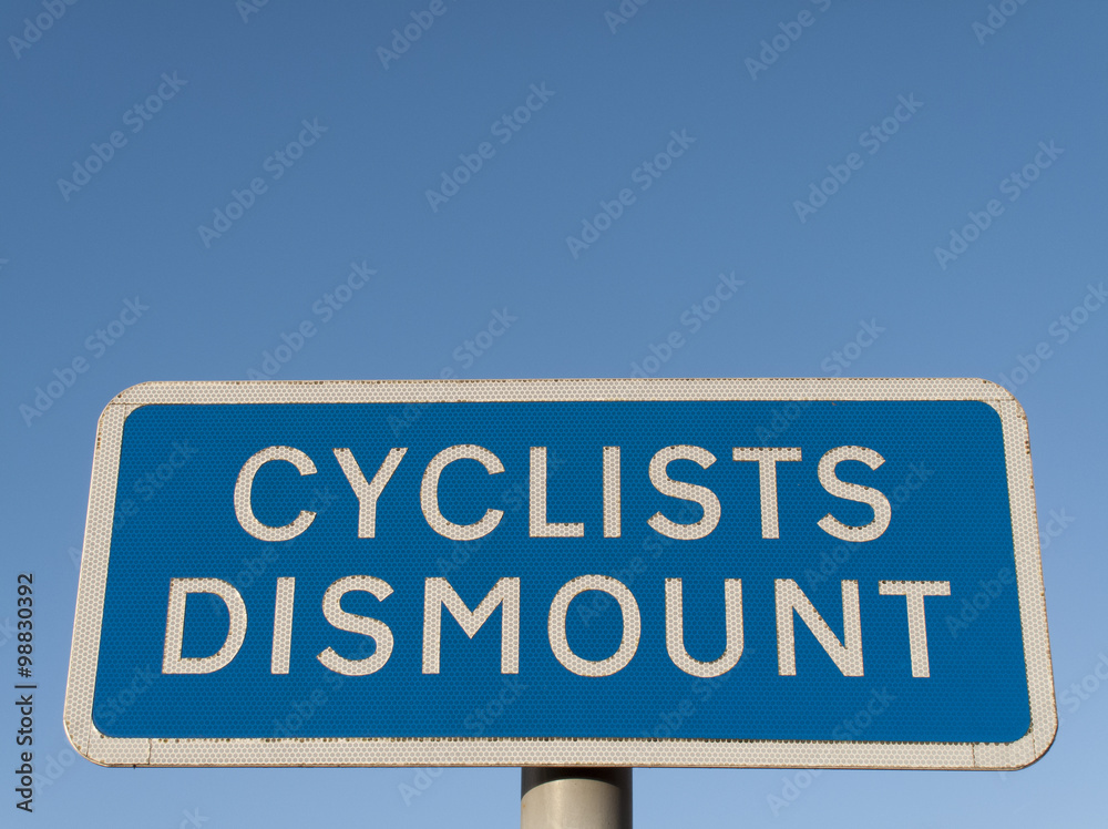 Cyclist dismount road sign 