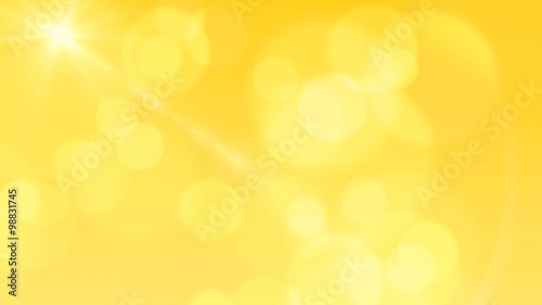 bright bokeh light flares yellow abstract background photo