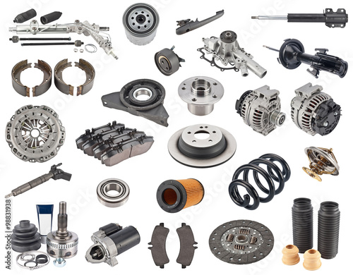 A new set of replacement automotive Car spare parts on white