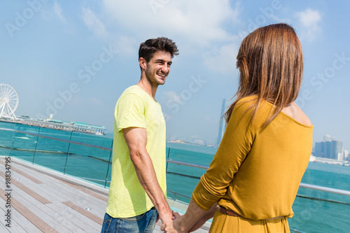 Couple holding hand together