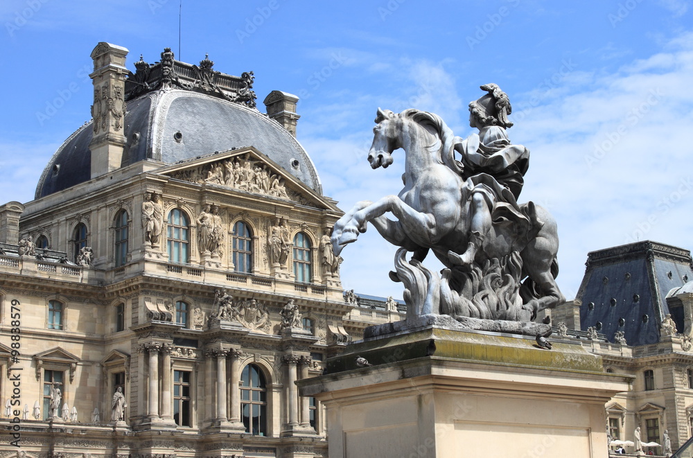 Louvre Museum and the Louis XIV Equestrian statue. Paris, France