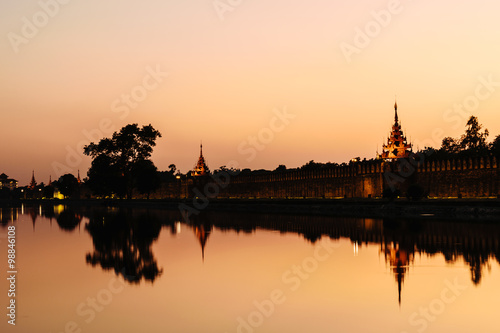 Moat and Fort of Mandalay palace at sunset