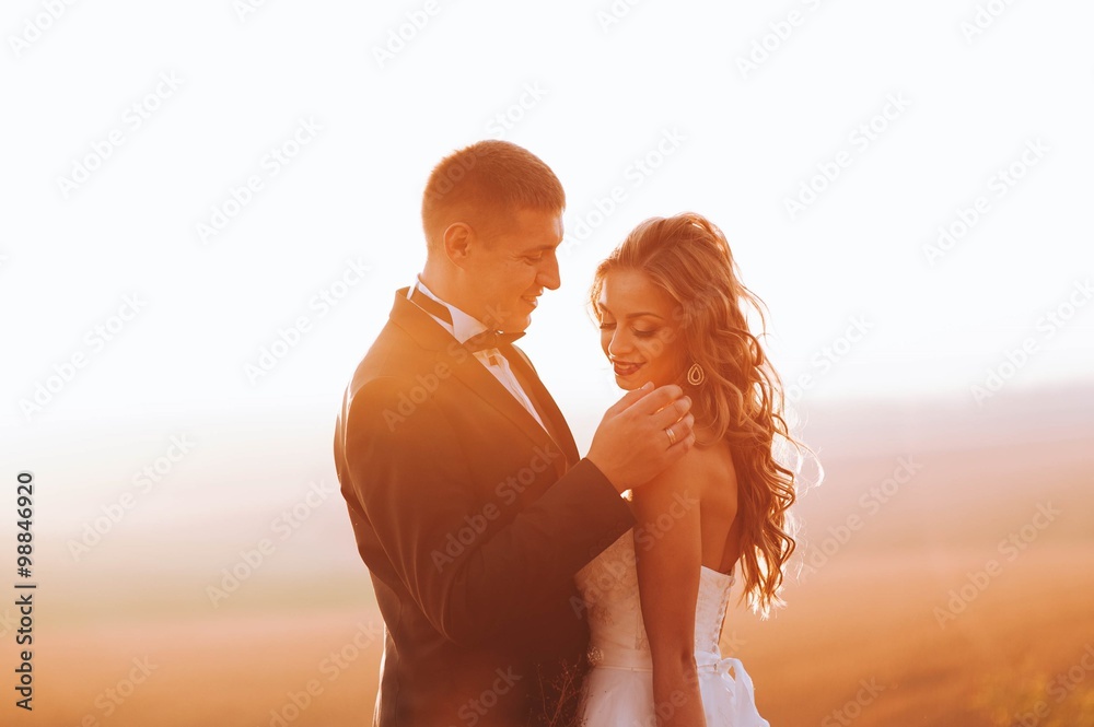 Fototapeta premium Fine art photo of an attractive wedding couple