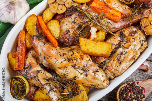 Roasted rabbit with herbs and vegetables