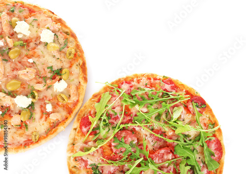 Two delicious tasty pizzas, isolated on white