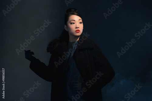 фотографія High society retro 1940 asian fashion woman.