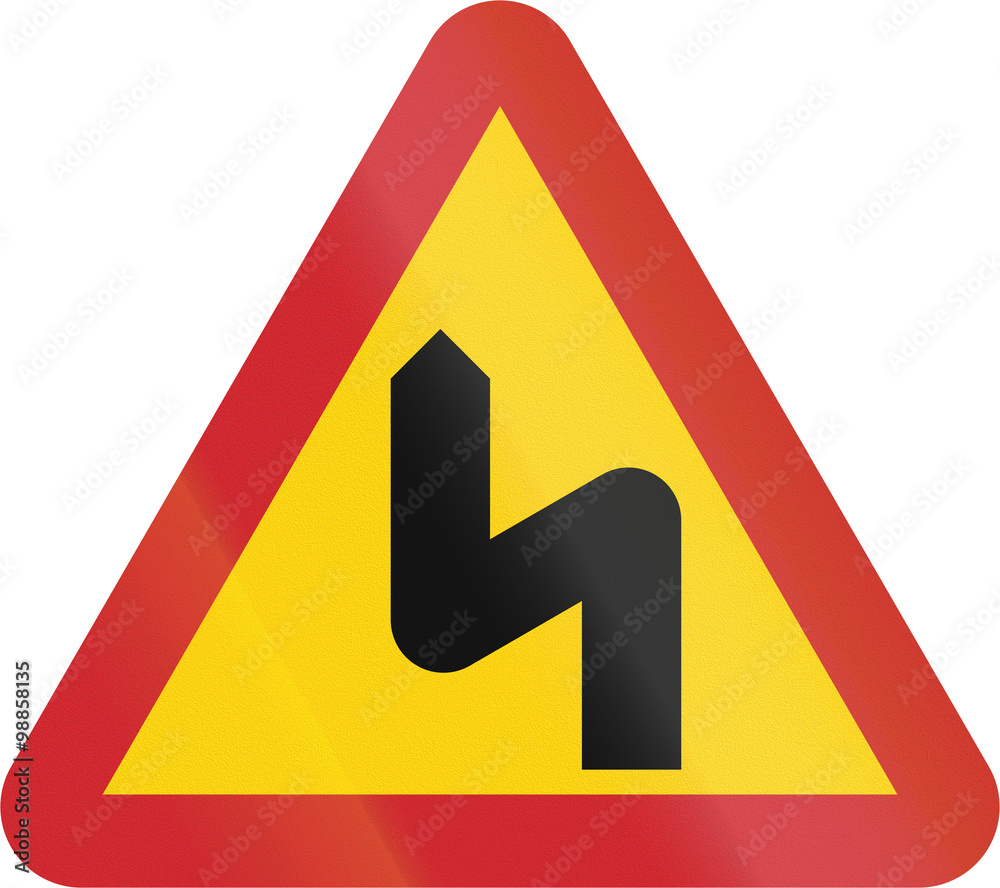 Road sign used in Sweden - Dangerous curves ahead, first to left Road sign used in Sweden - Dangerous curves ahead, first to left