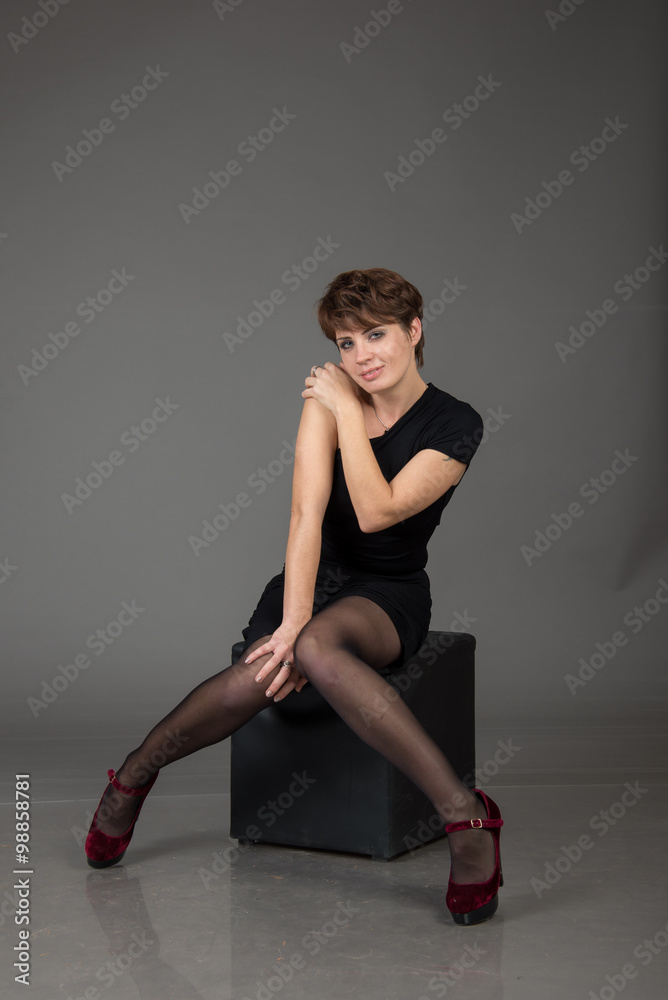 cute young girl on the shooting in the studio