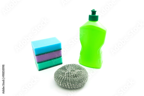 bottle and sponges on white