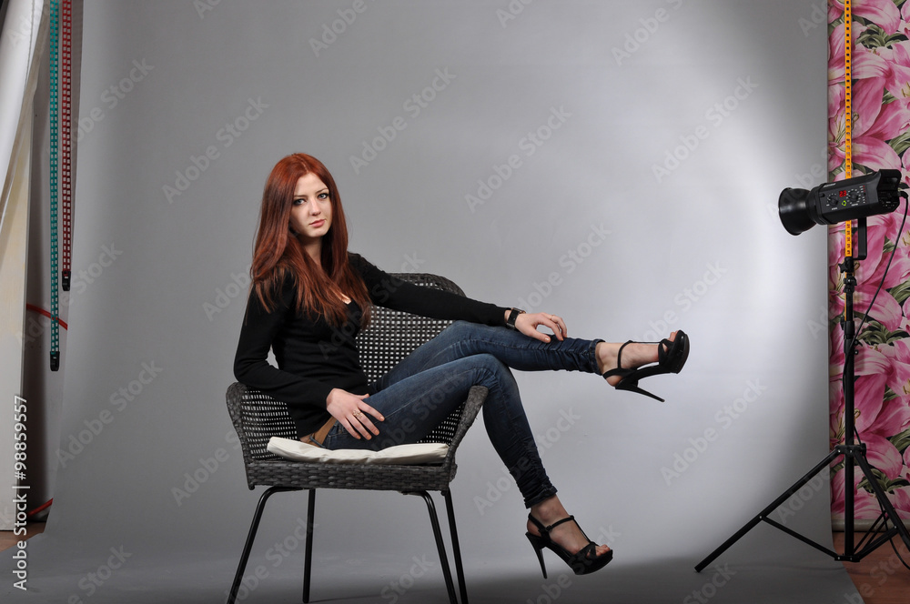 cute young girl on the shooting in the studio