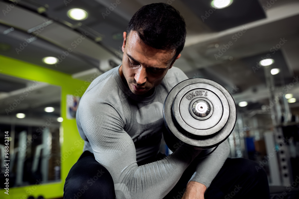 Strong powerful male exercise biceps Strong powerful male exercise biceps