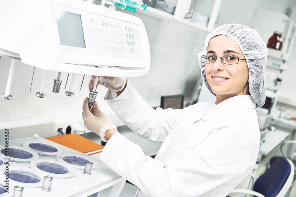 Pharmaceutical researcher making dissolution test