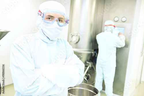 Portrait of worker at pharmaceutical factory