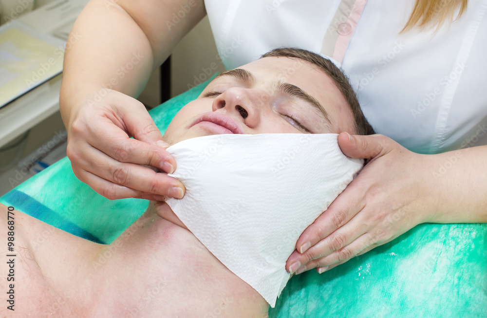 man in the mask cosmetic procedure in spa salon man in the mask cosmetic procedure in spa salon