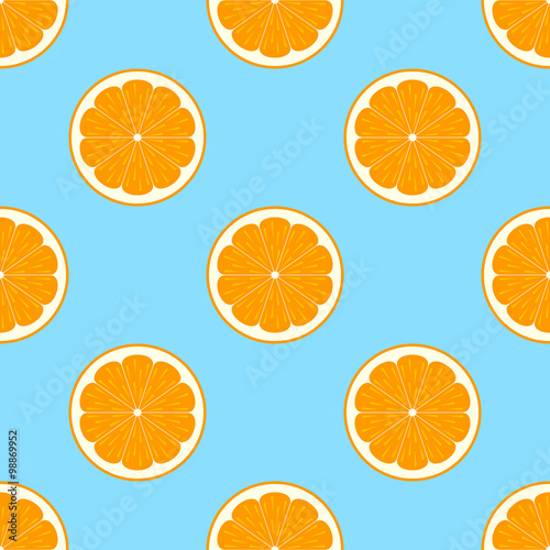Orange slices on blue background seamless pattern