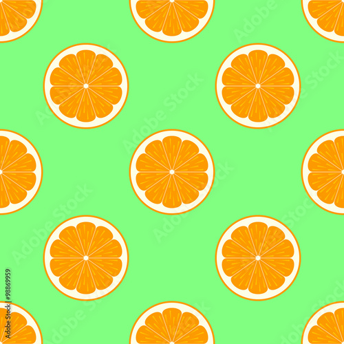 Orange slices on green background seamless pattern