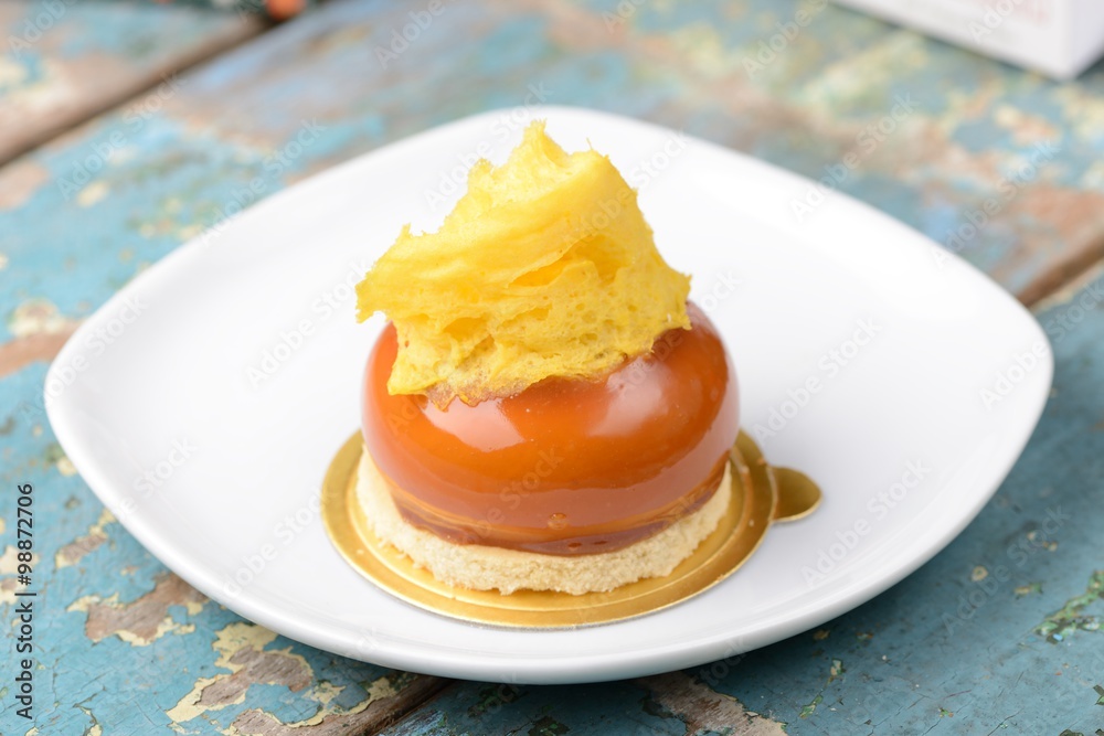Pumpkin Caramel Dessert on white isolate plate Pumpkin Caramel Dessert on white isolate plate