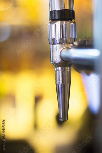 Lager draft beer pump in pub bar