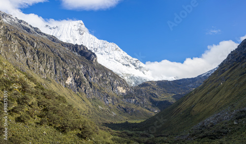 Snow covered mountain peak and blue sky  Cordillera Blanca  Peru
