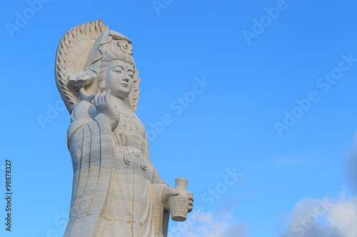 The marble Guan Yin hold vase and lotus in her hand