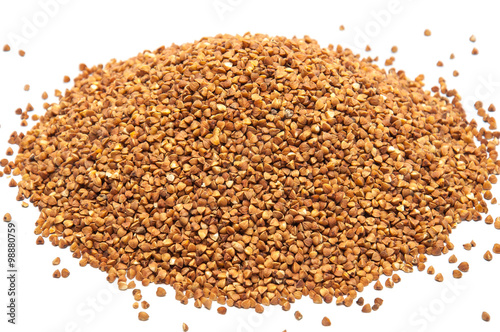 Heap of buckwheat grains on white background  close up view.