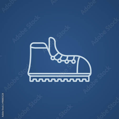 Hiking boot with crampons line icon.