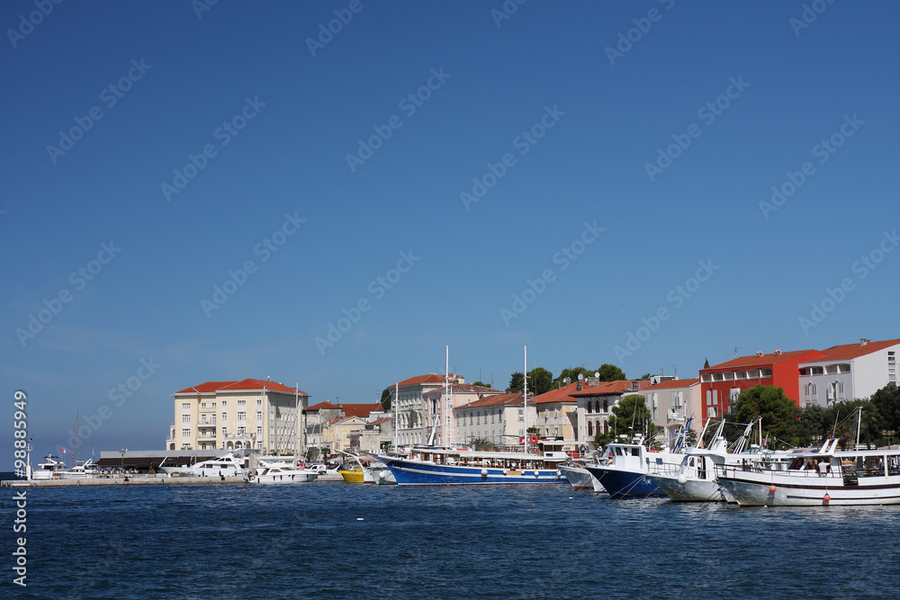 Tourist harbor in Porec  in Croatia in the summer day.