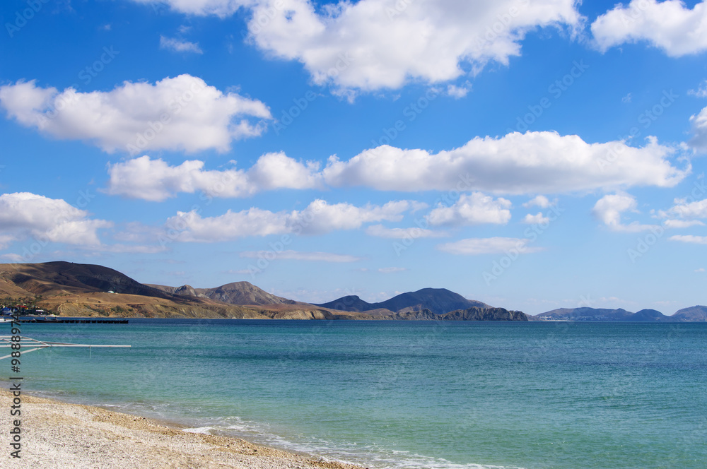  Crimean seascape with mountains on horizon and blue cloudy sky, Koktebel, Russia 