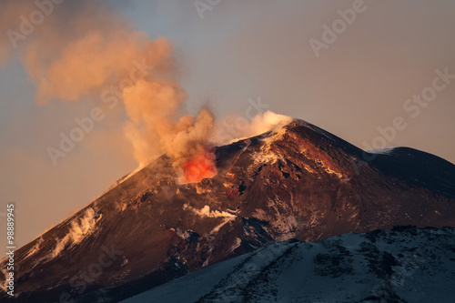 Volcano eruption. Mount Etna erupting from the crater Voragine 