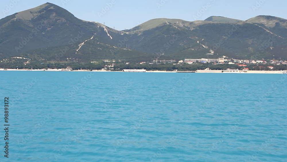 Summer panoramic view of the sea and mountain range Summer panoramic view of the sea and mountain range