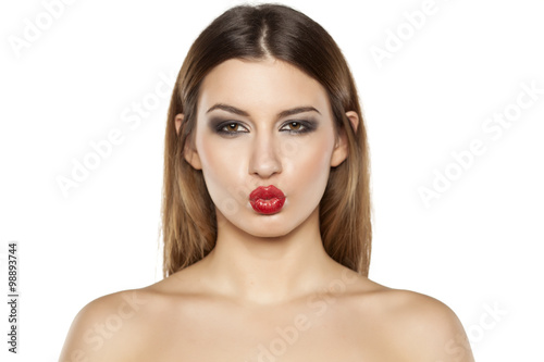 beautiful young woman with pursed lips