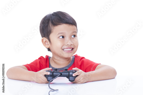 Little boy playing video game