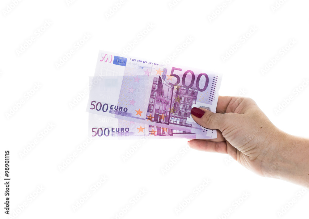 hand holding 500 euro money isolated on white background hand holding 500 euro money isolated on white background
