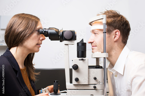 Man during an eye exam  photo