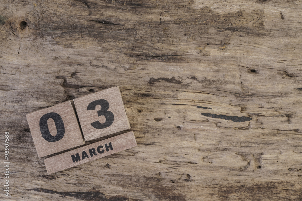 cube calendar for march on wooden surface with copy space (daily) cube calendar for march on wooden surface with copy space (daily)