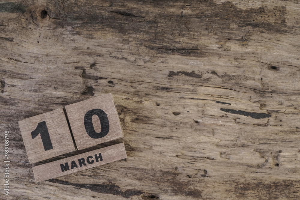cube calendar for march on wooden surface with copy space (daily) cube calendar for march on wooden surface with copy space (daily)